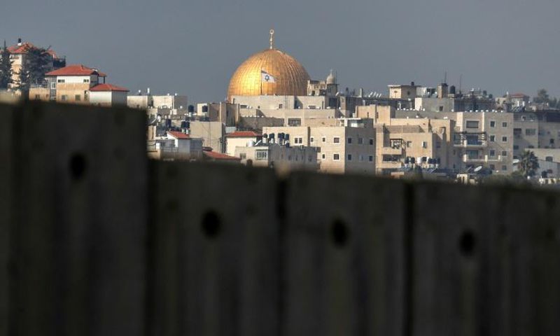 Jerusalem's iconic Dome of the Rock can be seen from Abu Dis -- but Israel's controversial barrier is in the way