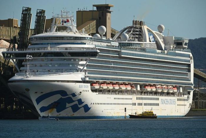 The cruise liner Ruby Princess sits in the harbour in Port Kembla, 80 kilometres (50 miles) south of Sydney after coming in to refuel and restock