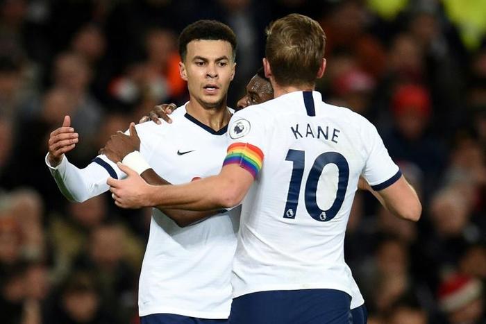 Dele Alli (left) celebrates his equaliser against Manchester United at Old Trafford