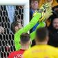 Manchester United goalkeeper David de Gea fumbles a shot from Watford's Ismaila Sarr into his own net