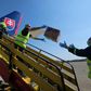 Police in Slovakia unload a plane after it touched down from China with testing kits and masks