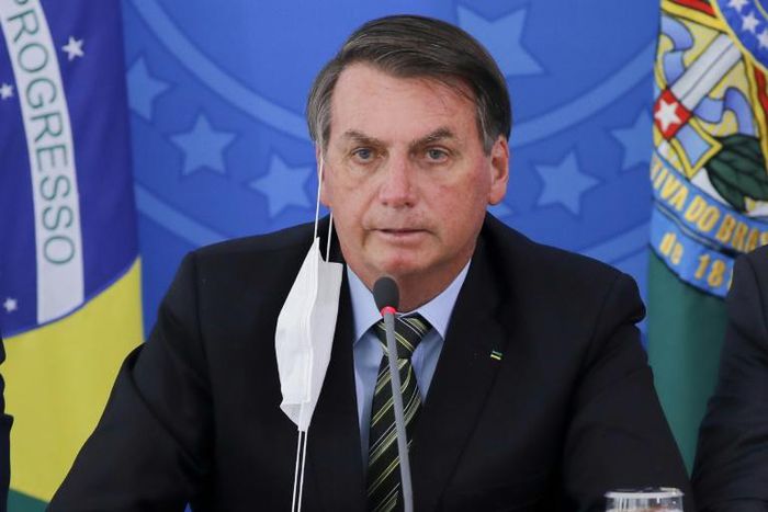 Brazil's President Jair Bolsonaro has faced nightly protests for weeks over his handling of the coronavirus crisis; he is pictured March 18, 2020