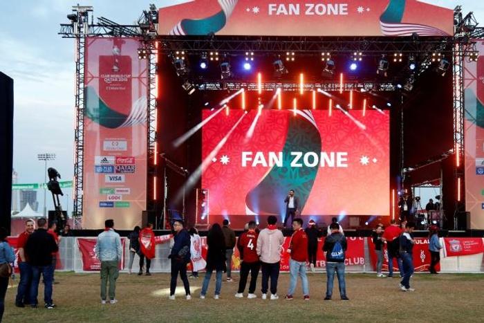 Fans start to gather at the fan Club World Cup fan zone ahead of Liverpool's semi-final clash with Monterrey