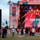 Fans start to gather at the fan Club World Cup fan zone ahead of Liverpool's semi-final clash with Monterrey