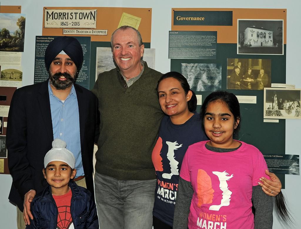 Mayor Ravinder Bhalla and his family pose with New Jersey Gov. Phil Murphy in 2018.