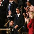 Venezuelan opposition leader Juan Guaido (C) waves as he is acknowledged by US President Donald Trump during his the State of the Union address at the US Capitol on February 4, 2020.