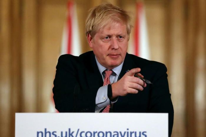 Britain's Prime Minister Boris Johnson announced new measures to halt the coronavirus outbreak 