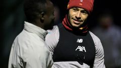 Liverpool midfielder Alex Oxlade-Chamberlain (right) has hailed the team's belief