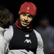 Liverpool midfielder Alex Oxlade-Chamberlain (right) has hailed the team's belief