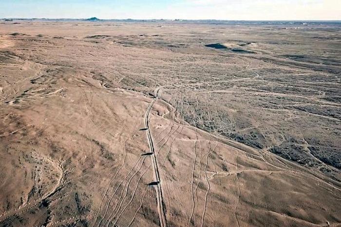 January 2019: A convoy of pickup trucks carrying migrants crosses the Air Desert in northern Niger, heading towards the Libyan border post of Al Qatrun