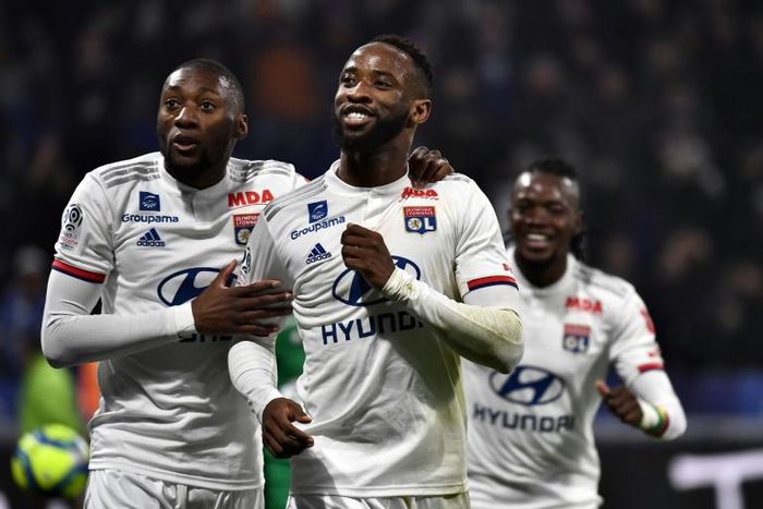 Moussa Dembele (C) scored both goals for Lyon in their 2-0 win over Saint-Etienne on Sunday