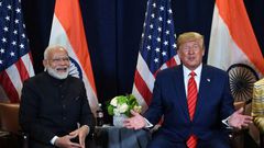 US President Donald Trump, seen here with Indian Prime Minister Narendra Modi, did not know that India shared a border with China, according to a new book