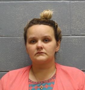 Mother, grandmother and grandfather accused of locking children in wooden cages