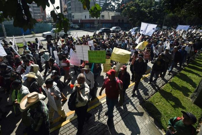 Guatemalan civilian and rural organizations demonstrate in front of US Embassy in support of former Bolivian President Evo Morales, in Guatemala City, on November 14, 2019
