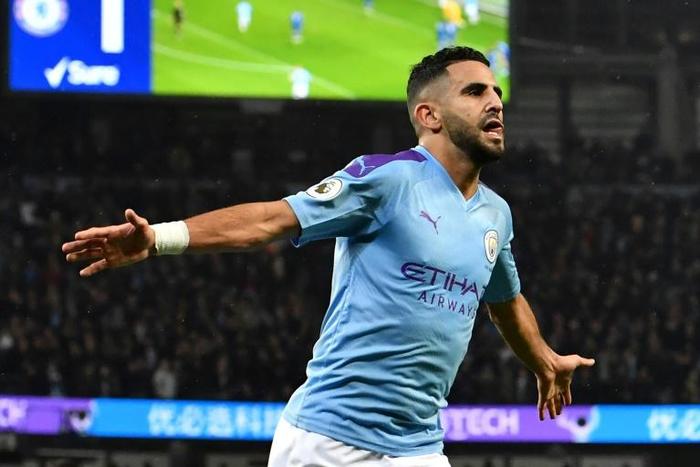 Magic Mahrez: Riyad Mahrez celebrates his strike to put Manchester City 2-1 up