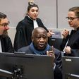 Former Ivory Coast President Laurent Gbagbo (C) has asked the ICC for unconditional release following his acquittal last year