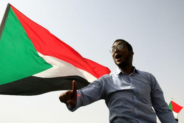 A Sudanese protester chants slogans in the capital Khartoum's Green Square on July 18, 2019, during a rally to honour comrades killed in the months-long protest movement that has rocked the country