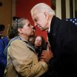 Democratic presidential candidate Joe Biden speaks to a supporter in Somersworth, New Hampshire