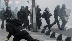 Riot police officers faced off against demonstrators during a "yellow vest" protest in Nantes, western France, on November 16