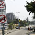 Signs displayed to reinforce a ban on motorbike taxis and motorised rickshaws, known locally as 'okadas' and 'kekes' which has sparked uproar in the Nigerian commercial capital Lagos