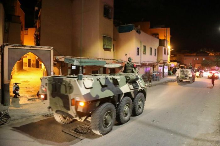 Military vehicles patrol the streets in the Moroccan city of Marrakesh to help enforce the government's order for people to stay at home amid the coronavirus COVID-19 pandemic