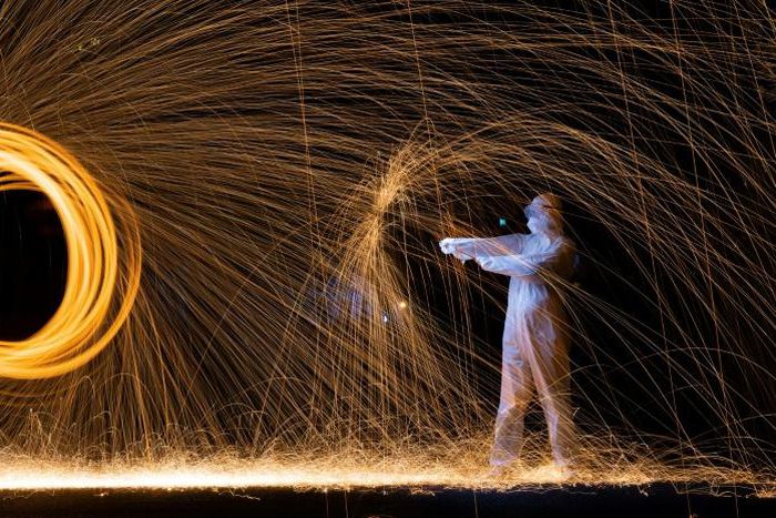 Beijing-based artist Roy Wang has paid tribute to doctors and nurses battling to treat virus patients in his latest light painting creations