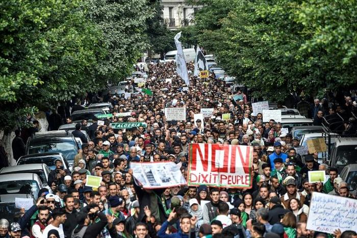 Algerians hold an anti-government demonstration in the capital Algiers rejecting a December 12 presidential vote