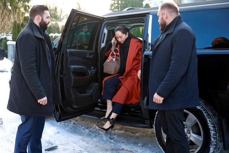 Huawei executive Meng Wanzhou, whom the US has accused of fraud, exits her vehicle at her home after her court appearance on January 17, 2020 in Vancouver, Canada