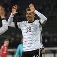 Goal scorers Leon Goretzka (R) and Toni Kroos (L) celebrate as Germany brushed past Belarus with a 4-0 win to qualify for Euro 2020