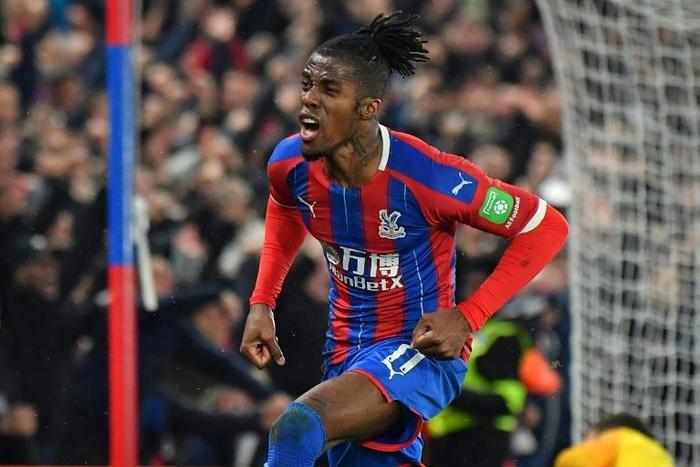 Get in - Crystal Palace striker Wilfried Zaha celebrates his equaliser in a 1-1 draw with Brighton