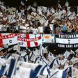 Tottenham Hotspur fans cheer their team before the UEFA Champions League final football match against Liverpool in Madrid in June 2019