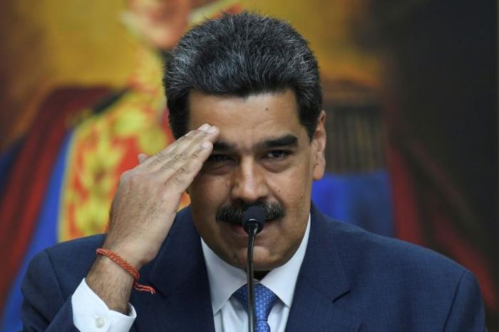 (FILES) In this file photo taken on February 14, 2020 Venezuela's President Nicolas Maduro gestures during a press conference
