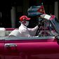 The driver of a vintage American car wears a face mask while taking tourists around Havana -- but Cuba is to close to visitors over the coronavirus outbreak