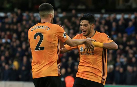 Raul Jimenez (right) and Matt Doherty (left) combined to secure Wolves a 1-1 draw with Sheffield United