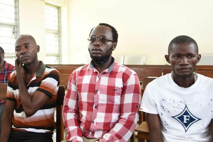 Tanzanian journalist Erick Kabendera (C), seen here in an earlier court appearance, was released after he pleaded guilty