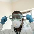 Virus threat: A lab technician gears up for visiting a quarantine ward at the Kenyatta National Hospital in Nairobi