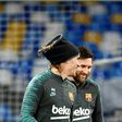 Barcelona stars Lionel Messi (R) and Antoine Griezmann train at Napoli's San Paolo stadium