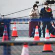 Hundreds of people have been allowed to leave the ship after testing negative for the new coronavirus