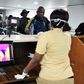 A thermal scanner screens passengers at Lagos international airport