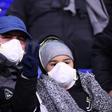 Juventus supporters wear protective face masks as a safety measure against the COVID-19