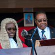 President Peter Mutharika (shown being sworn in May 28, 2019 by Chief Justice Andrew Nyirenda, L) is appealing after the Constitutional Court annulled the election and ordered a re-run, citing 'grave' and 'widespread' irregularities