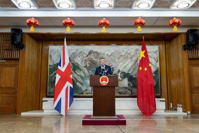 China's ambassador to Britain Liu Xiaoming warned Beijing would not 'sit on our hands and watch' if the situation in Hong Kong spiralled out of control