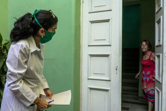 Cuban doctor Liz Caballero goes door-to-door in Havana on March 31 looking for possible cases of coronavirus