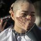 Li Wenzu shaved her head in 2018 in protest at the jailing of her husband Wang Quanzhang during the 709 crackdown