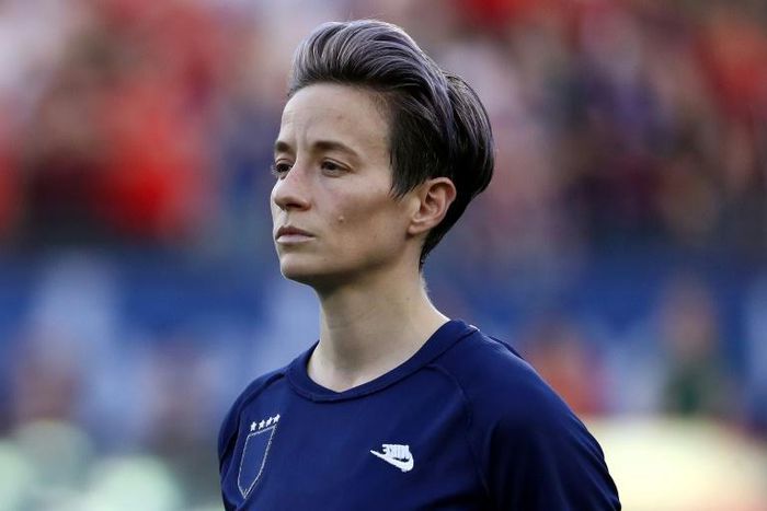 US star Megan Rapinoe wears her jersey inside-out to hide the US Soccer Federation logo during the national anthem before a SheBelieves Cup match against Japan in Frisco, Texas