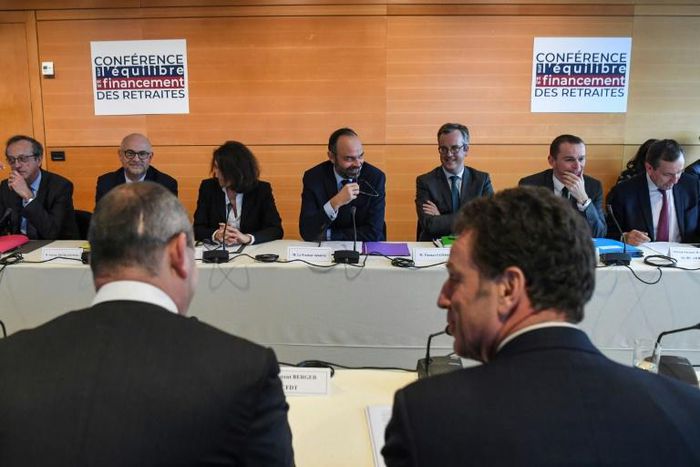 French Prime Minister Edouard Philippe, centre, opened talks with union and employer representatives on financing a planned pension overhaul in Paris on Thursday.