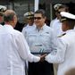 Honduran President Juan Orlando Hernandez (C), shown at the handover ceremony for a coastal patrol vessel bought from Israel, has dismissed as "absurd" accusations that he received bribes from drug lords