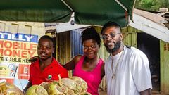 ‘God bless your hustle’ – Adebayor inspires couple selling coconut on the street