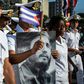 Members of the Navy display a picture of Cuban former president Fidel Castro during the May Day parade at Revolution Square in Havana, on May 1, 2016