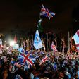 Brexit supporters wave Union flags as they gathered in Parliament Square on January 31, 2020, the day that the UK formally left the European Union